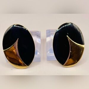 Vintage black enamel and gold pierced oval stud earring. Gold tone. Statement